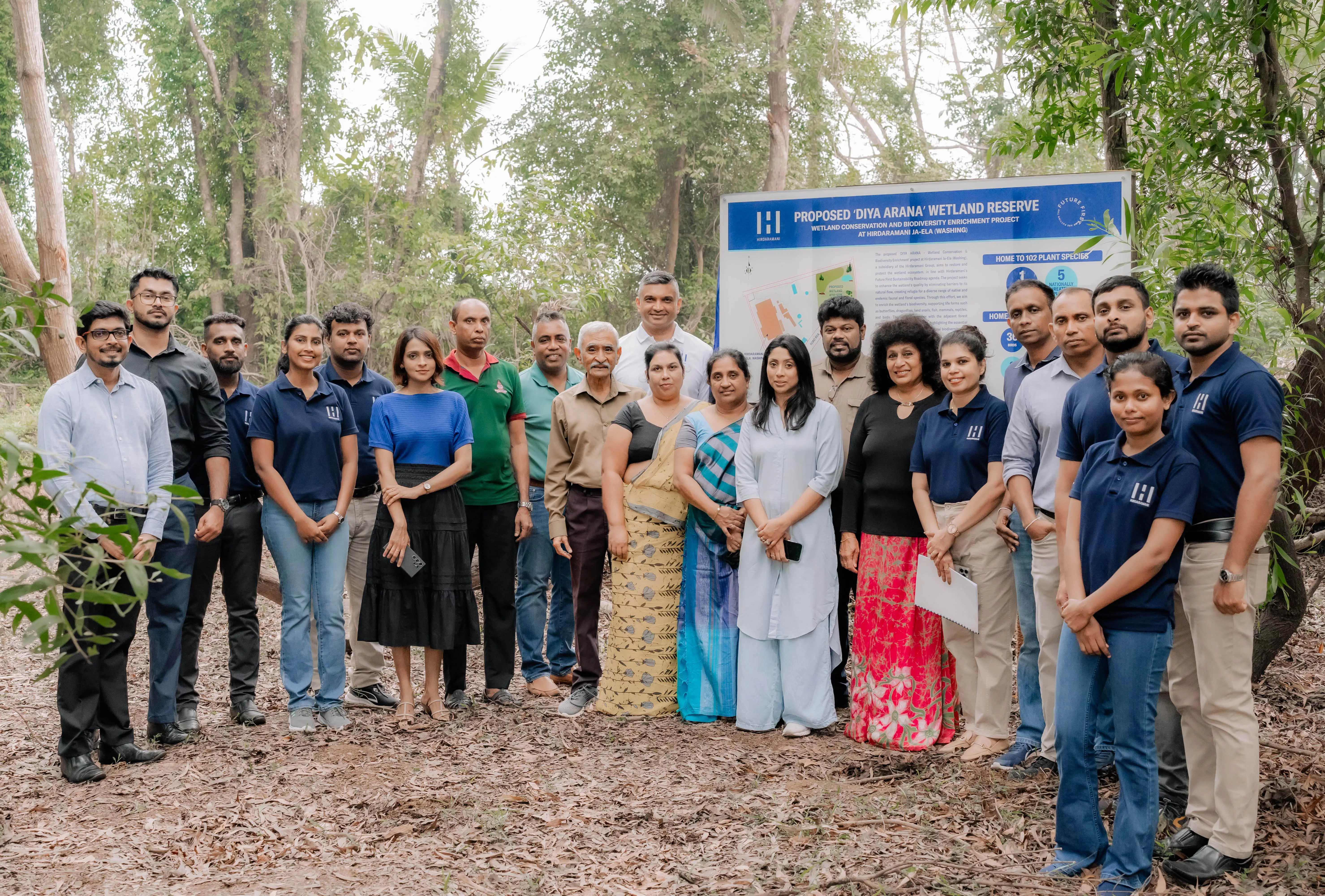 Hirdaramani employees in a group photo at proposed diya arana wet land reserve
